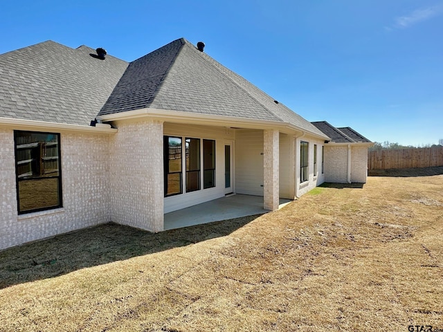 rear view of house with a patio