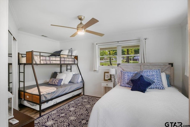 23324 Bay Side Dr, Bullard, TX 75757 - bedroom featuring wood finished floors, ornamental molding, and ceiling fan