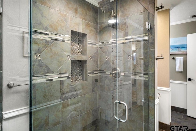 23324 Bay Side Dr, Bullard, TX 75757 - full bathroom featuring ornamental molding, a shower stall, and wainscoting
