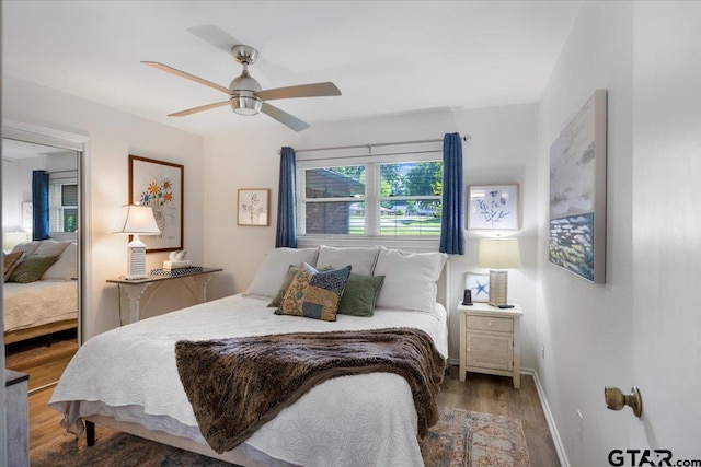 23324 Bay Side Dr, Bullard, TX 75757 - bedroom with wood finished floors and a ceiling fan