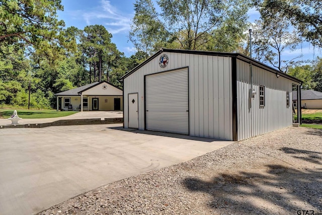 view of outbuilding with a garage