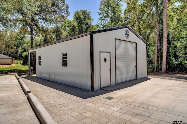 view of outbuilding with a garage