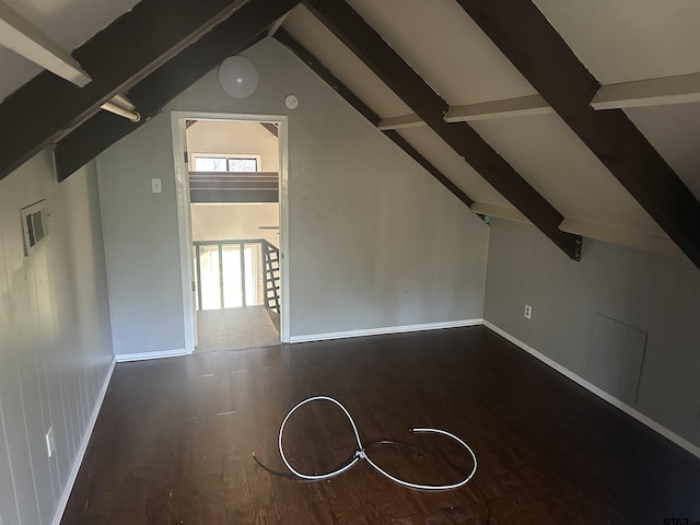 bonus room with lofted ceiling and dark hardwood / wood-style floors