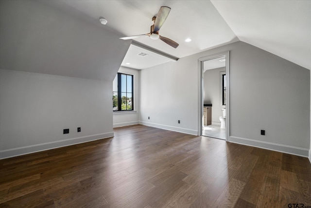 additional living space featuring ceiling fan, dark hardwood / wood-style flooring, and lofted ceiling