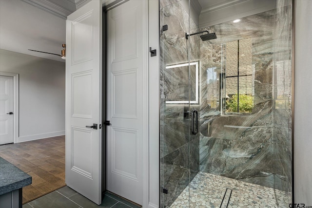 bathroom with vanity, tile patterned flooring, a shower with door, and ornamental molding