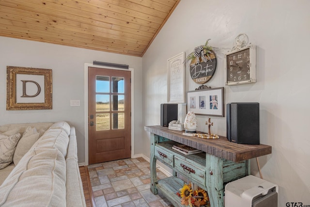 foyer entrance featuring lofted ceiling and wooden ceiling