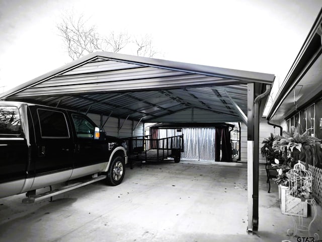 garage featuring a carport