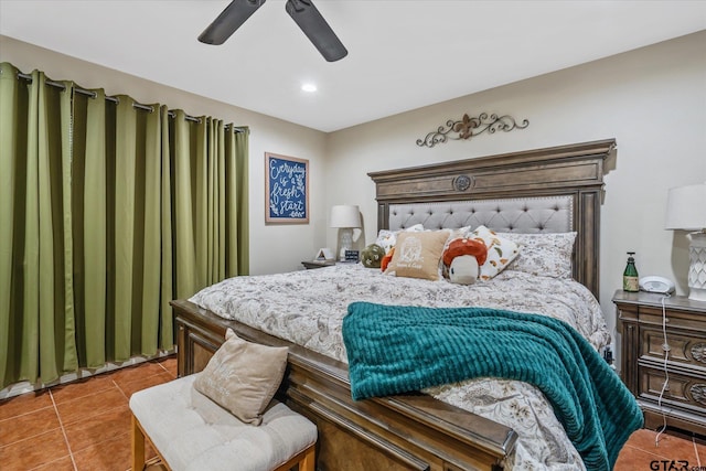 bedroom featuring ceiling fan and tile patterned flooring