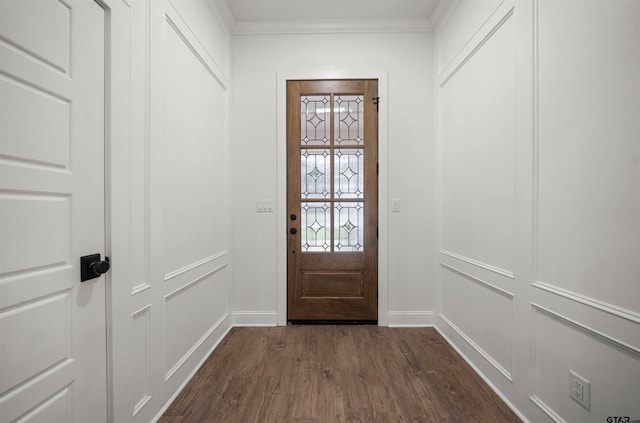 21488 Forest Pl, Flint, TX 75762 - doorway featuring dark wood-style floors, a decorative wall, and ornamental molding