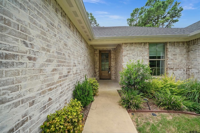 21488 Forest Pl, Flint, TX 75762 - property entrance featuring roof with shingles and brick siding