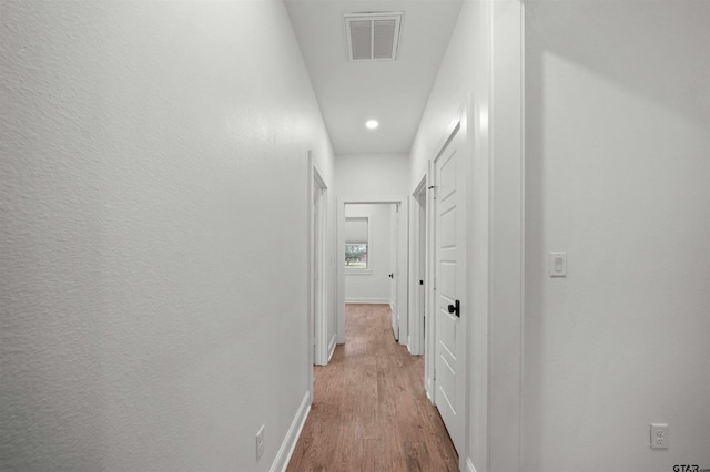 21488 Forest Pl, Flint, TX 75762 - hallway with light wood-type flooring and recessed lighting