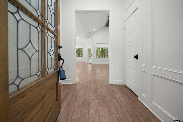21488 Forest Pl, Flint, TX 75762 - corridor with wood finished floors and vaulted ceiling