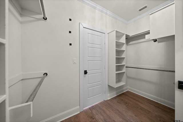 21488 Forest Pl, Flint, TX 75762 - spacious closet featuring dark wood-style flooring