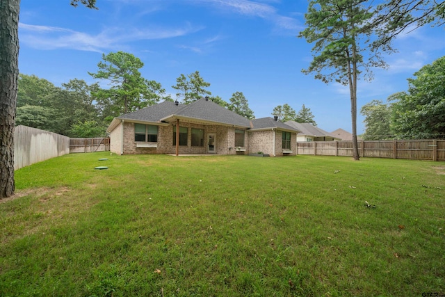 21488 Forest Pl, Flint, TX 75762 - back of property featuring a fenced backyard and brick siding