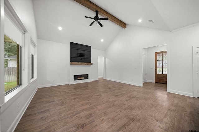 21488 Forest Pl, Flint, TX 75762 - unfurnished living room with a large fireplace, beamed ceiling, wood finished floors, ceiling fan, and recessed lighting
