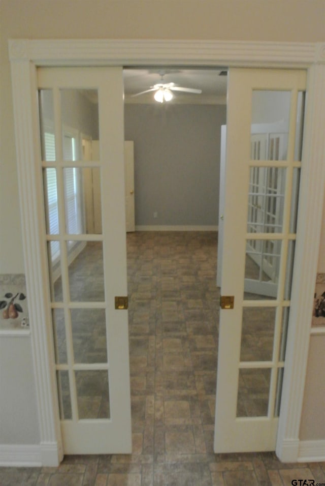 interior space featuring french doors and ceiling fan