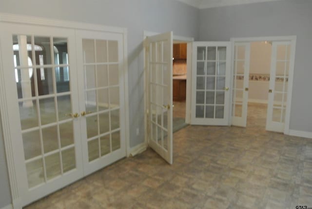 spare room with french doors