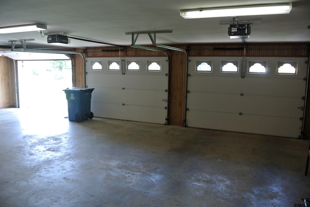 garage featuring a garage door opener