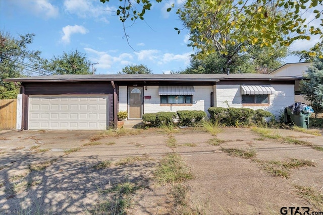 ranch-style house with a garage