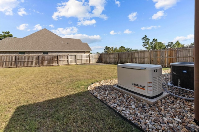 view of yard with central AC unit