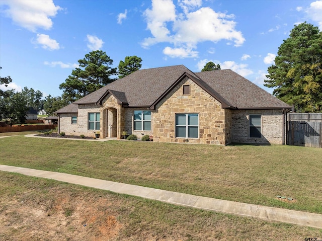 view of front of house with a front lawn