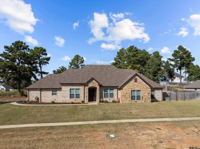 view of front facade with a front lawn