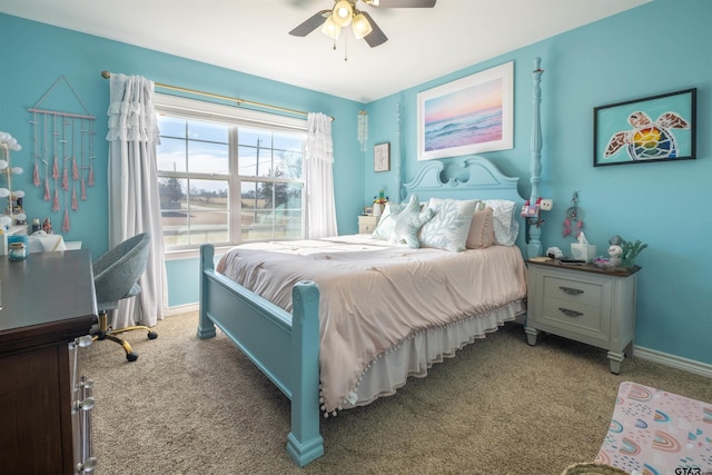 bedroom featuring ceiling fan and light carpet