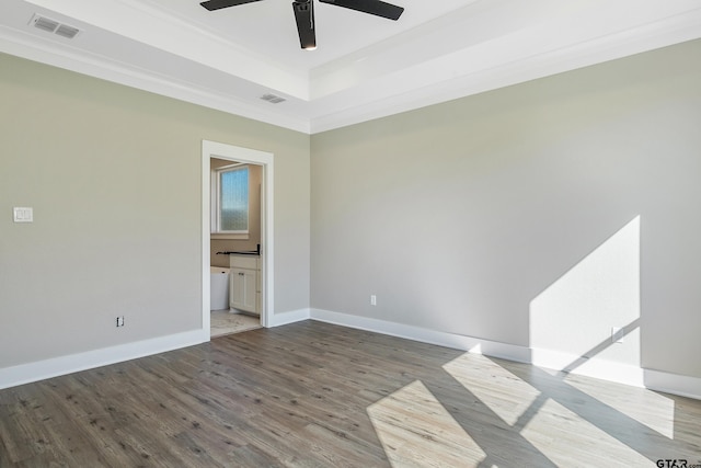 spare room featuring ornamental molding, hardwood / wood-style floors, and ceiling fan