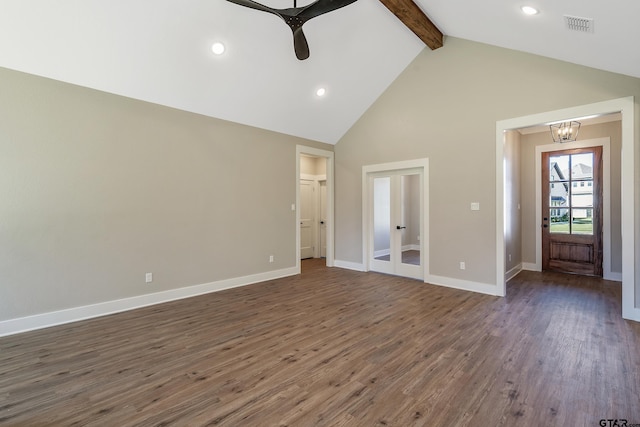 unfurnished living room featuring french doors, beam ceiling, high vaulted ceiling, dark wood-type flooring, and ceiling fan with notable chandelier