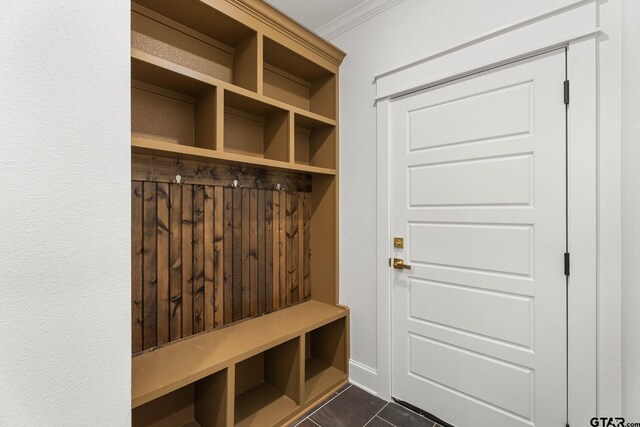 11905 Tara Ln, Lindale, TX 75771 - mudroom with crown molding and dark tile patterned floors