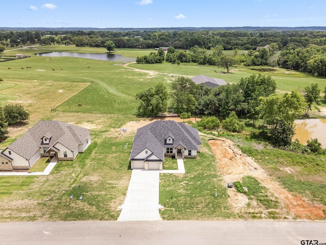 11905 Tara Ln, Lindale, TX 75771 - view from above of property featuring a large body of water and a tree filled landscape