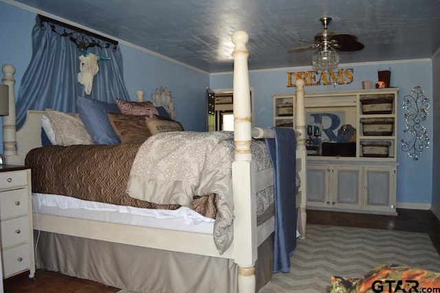 bedroom with ornamental molding and ceiling fan