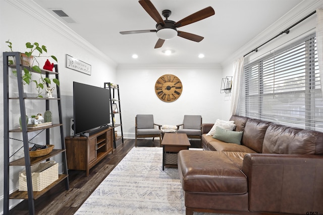 living room featuring crown molding, dark hardwood / wood-style floors, and ceiling fan