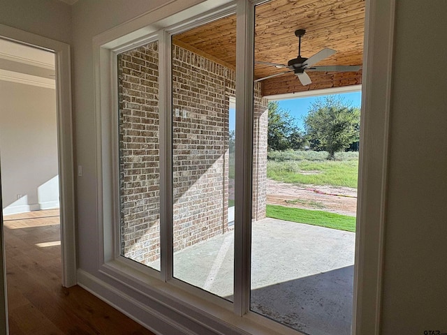 room details featuring hardwood / wood-style floors, ceiling fan, and wood ceiling