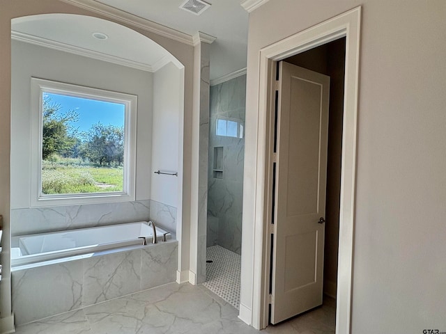 bathroom with plus walk in shower and ornamental molding