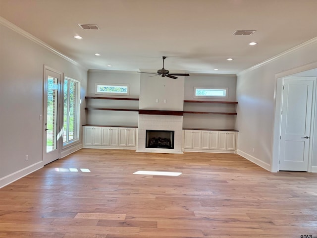 unfurnished living room with ceiling fan, ornamental molding, and light hardwood / wood-style flooring