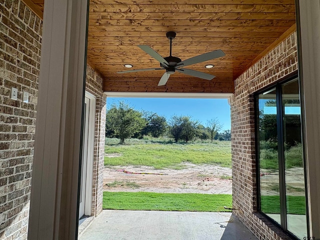 view of patio / terrace featuring ceiling fan