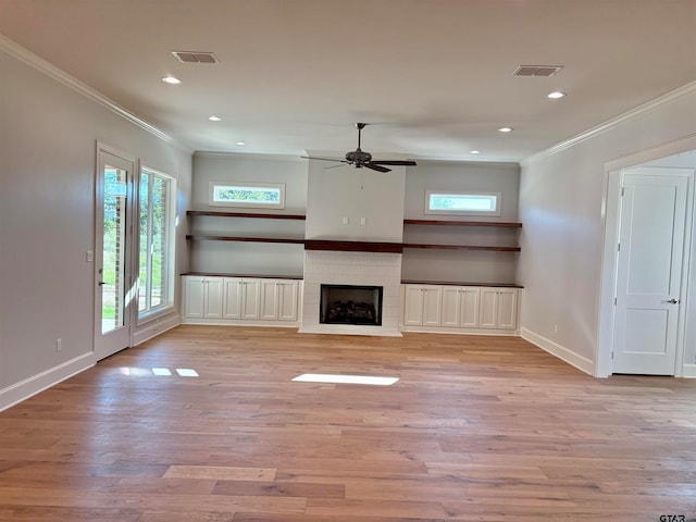 unfurnished living room with ornamental molding, ceiling fan, and light hardwood / wood-style floors