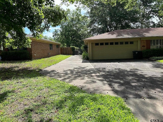 view of property exterior featuring a garage