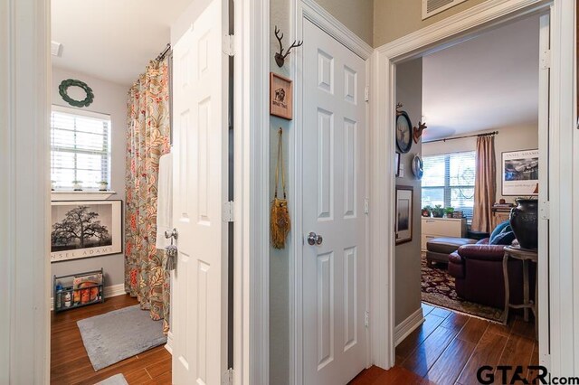 bathroom with vanity and hardwood / wood-style flooring