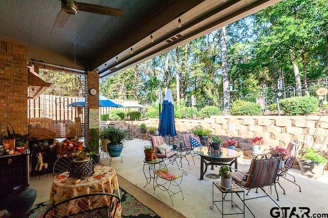 view of patio with ceiling fan