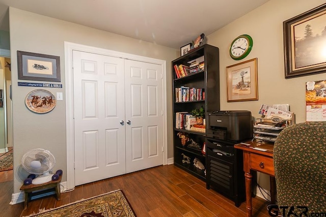 office with dark hardwood / wood-style floors