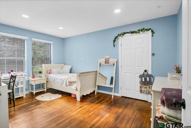 107 W Nutbush, Tyler, TX 75702 - bedroom featuring wood finished floors and recessed lighting