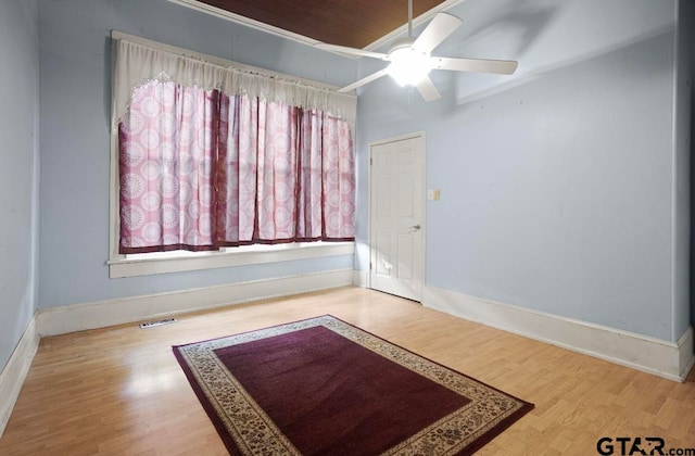 interior space with ceiling fan, a healthy amount of sunlight, and hardwood / wood-style flooring