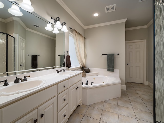 bathroom featuring a sink, a whirlpool tub, double vanity, and visible vents