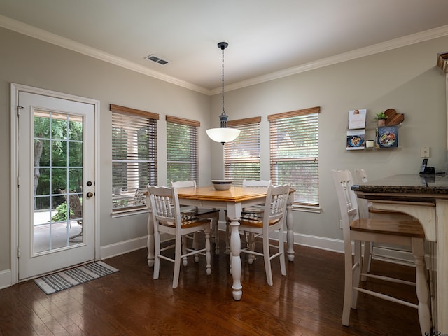 dining area featuring visible vents, baseboards, dark wood-type flooring, and a healthy amount of sunlight