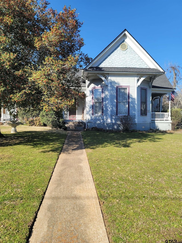 view of front of home with a front yard