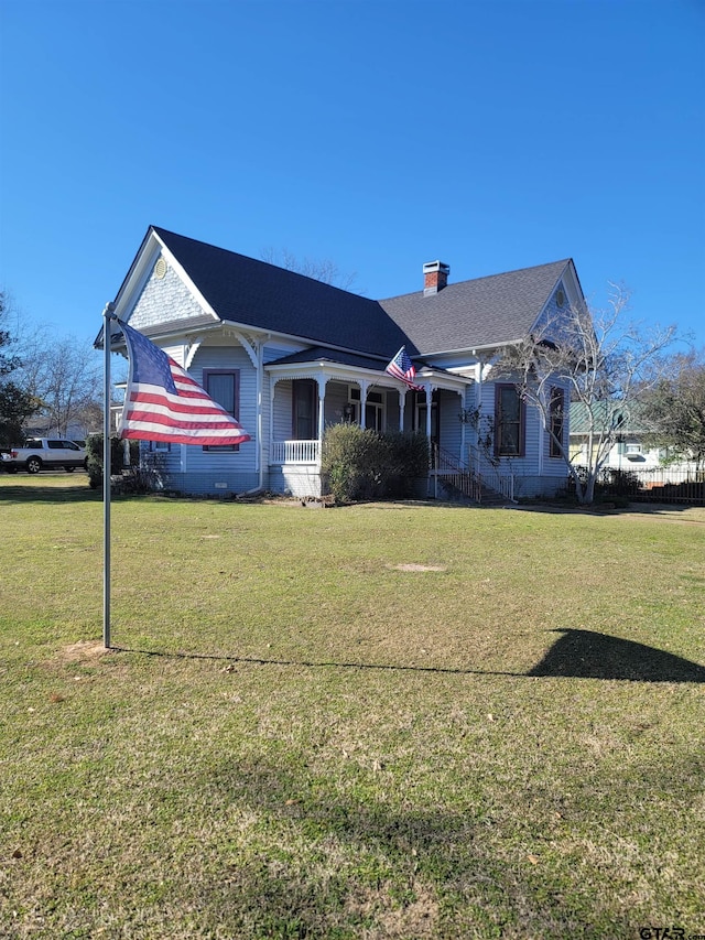 ranch-style home with a front yard