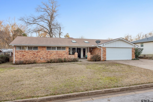 ranch-style home with a garage and a front yard