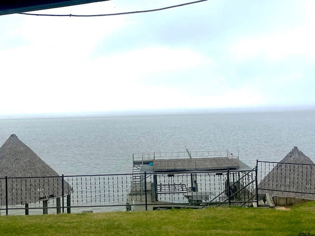 dock area with a water view and a gazebo